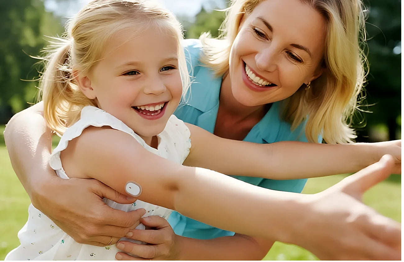 A mother hugging her smiling daughter outdoors